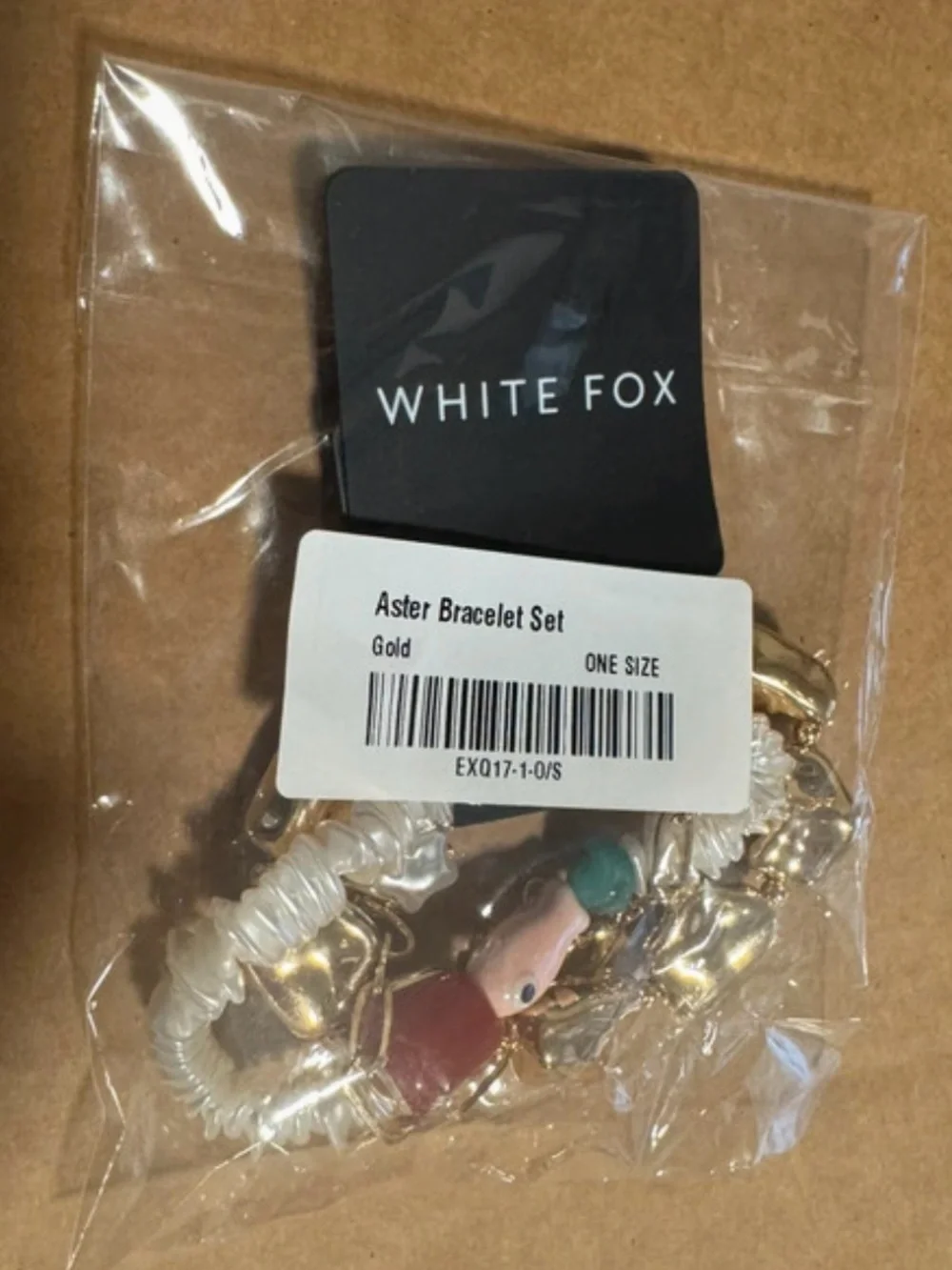 White Fox Boutique Multi-Chain Bracelet in Gold, White & Red